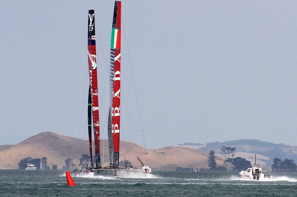 Emirates Team NZ gets through to windward and ahead of Luna Rossa as they near the first turning mark - March 8 2013, ETNZLR - - AC72 Race Practice - Takapuna March 8, 2013 © Richard Gladwell www.photosport.co.nz
